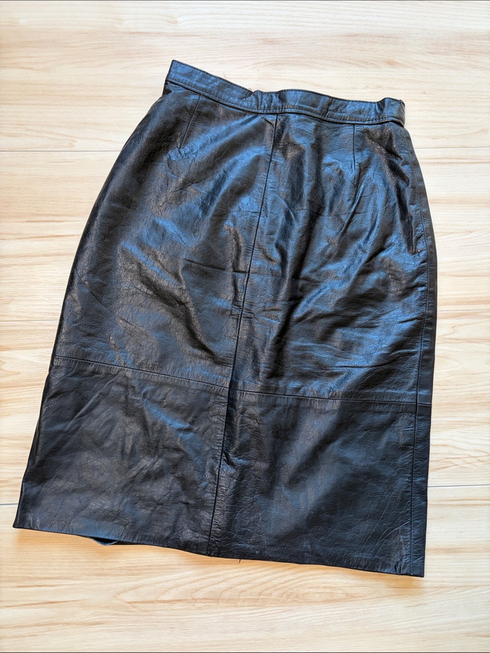 Sleek Black Genuine Leather Midi Skirt